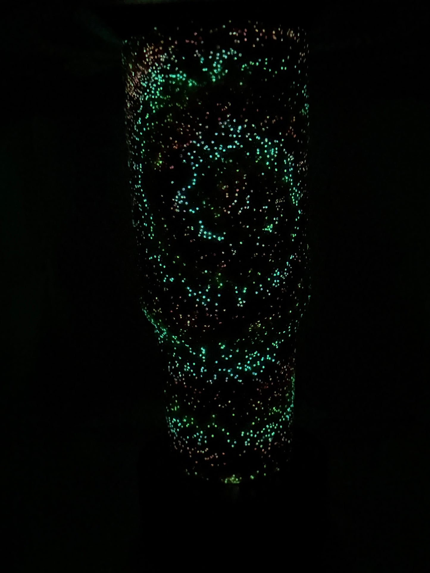 #6 40oz tie-dye glow in the dark tumbler.