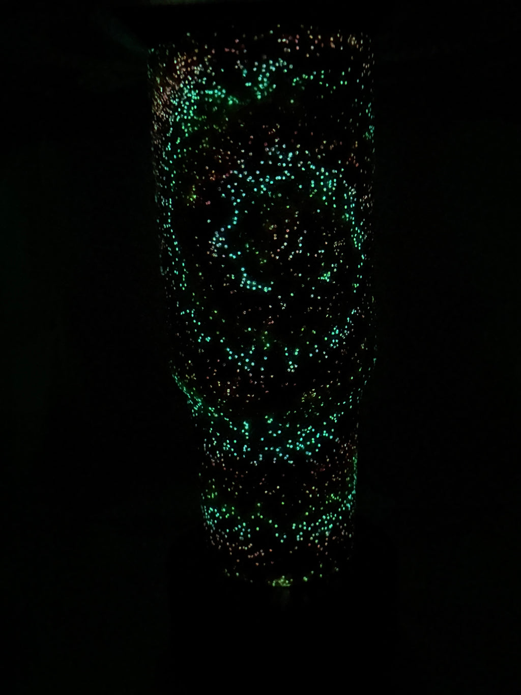 #6 40oz tie-dye glow in the dark tumbler.