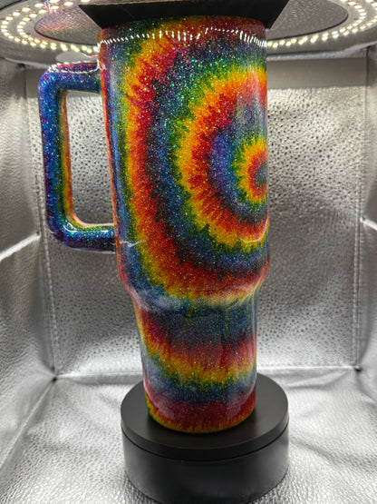 #6 40oz tie-dye glow in the dark tumbler.