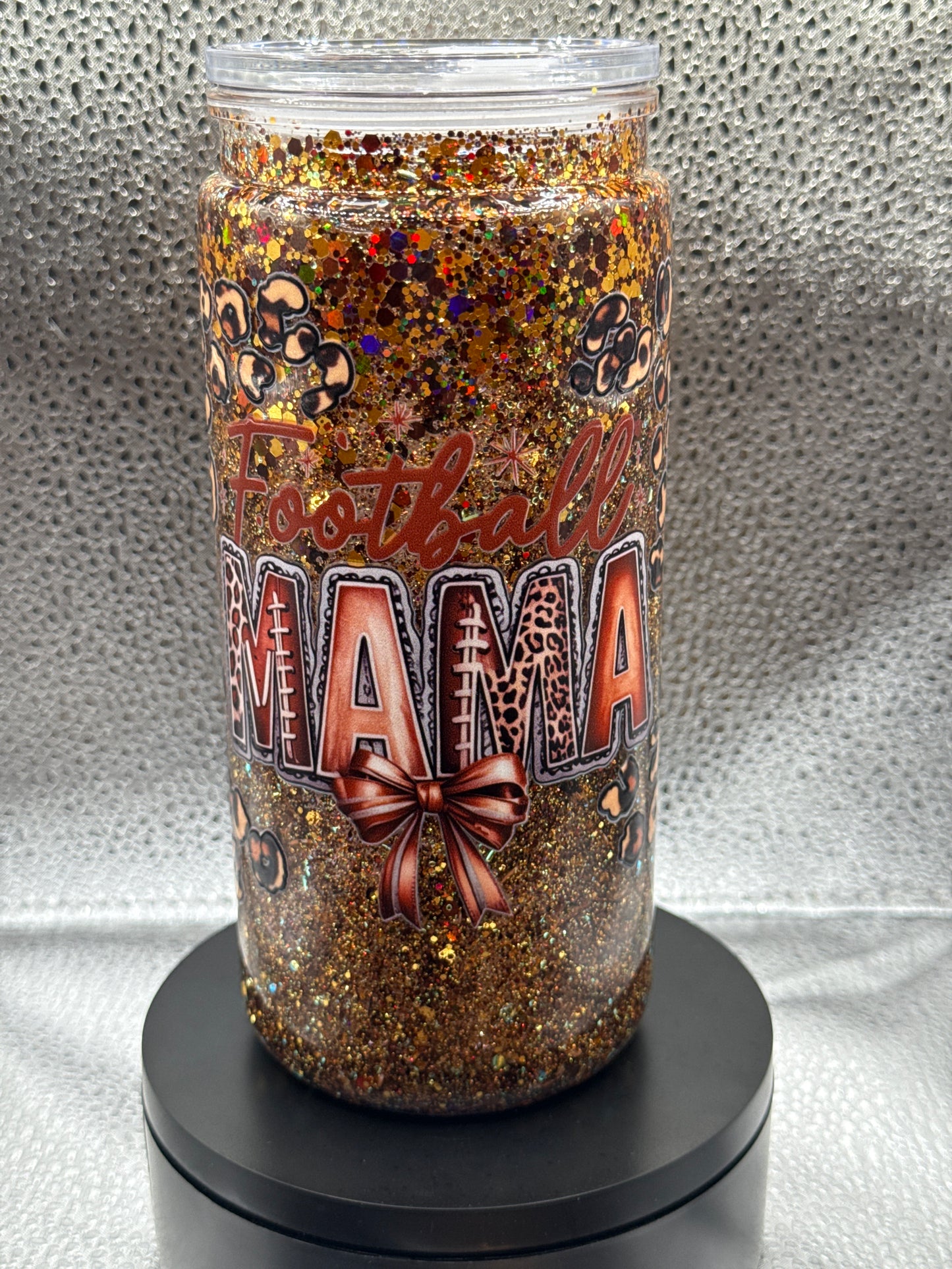 #17 20 oz leopard print football Mama ￼￼